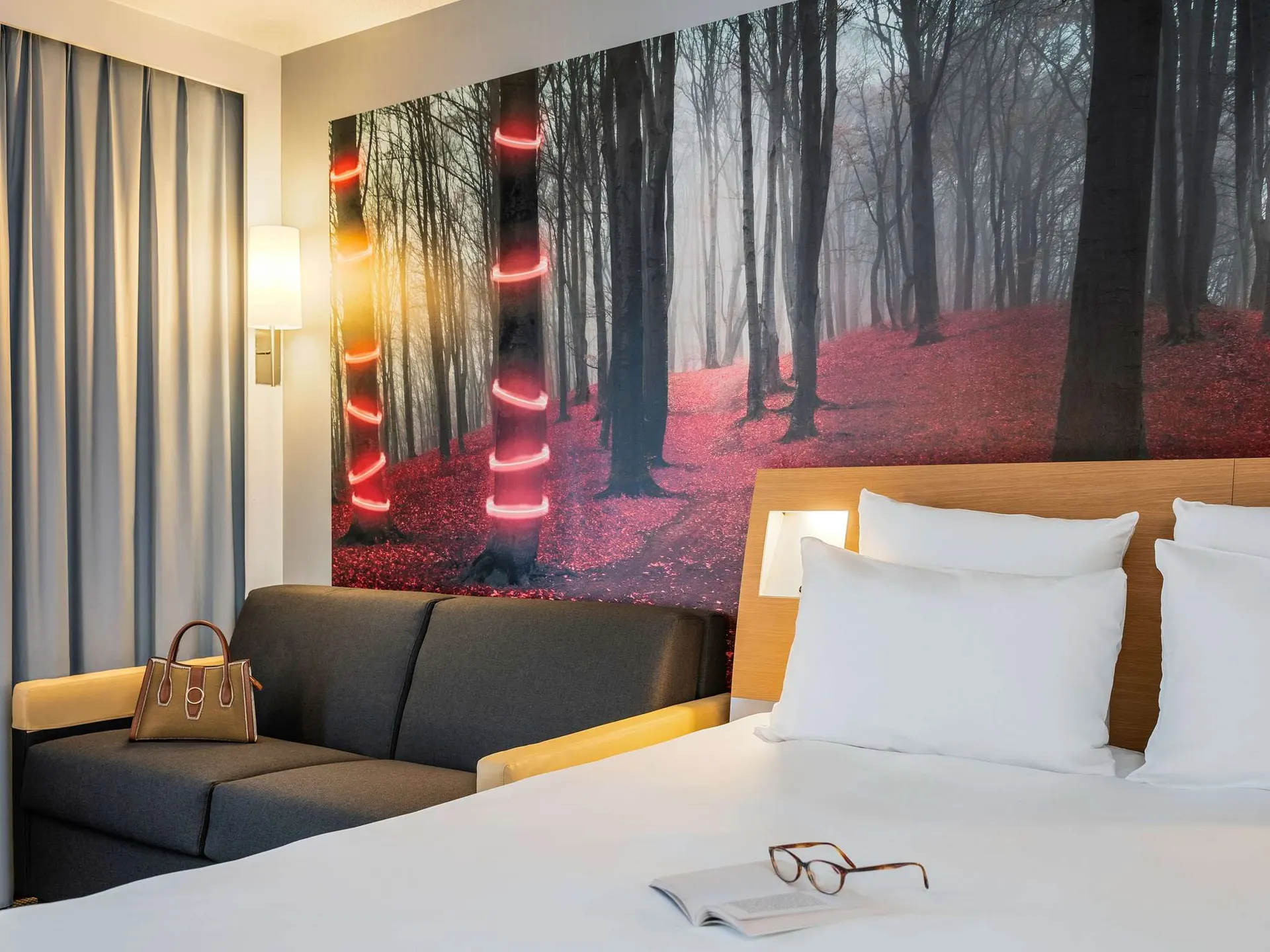 Een driepersoonskamer in Novotel Paris Est