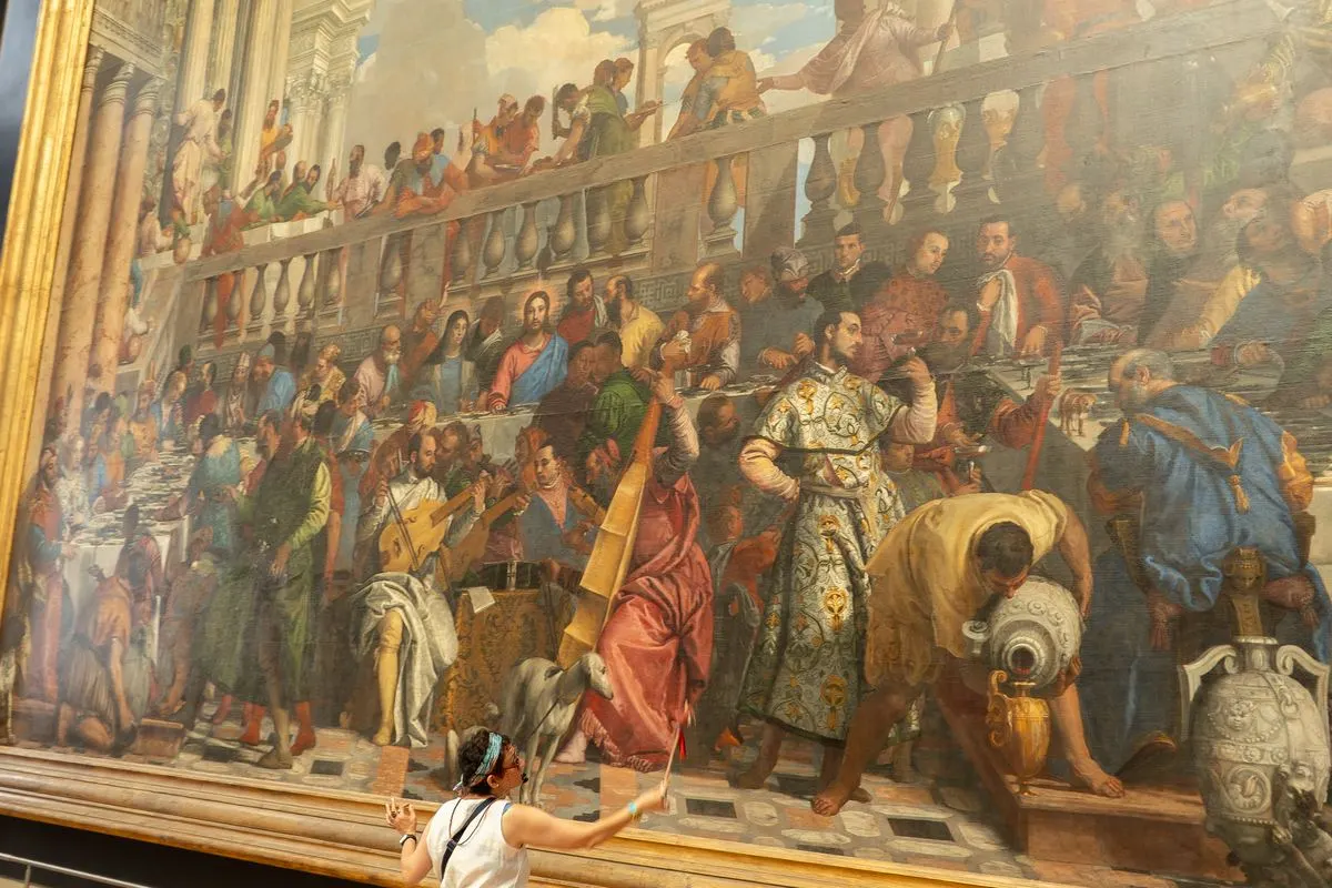 Het monumentale schilderij De bruiloft te Kana in het Louvre